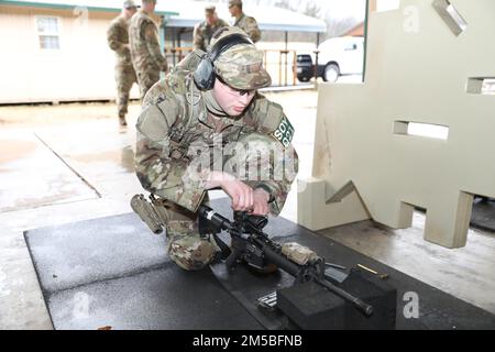 Senior Airman Samuel Parker, a security forces airman with Security Forces Squadron, 134th Air Refueling Wing, makes adjustments to his M4 Carbine during a live fire exercise in Smyrna on Feb. 22. The exercise was a part of the Tennessee National Guard's 2022 Best Warrior Competition. Stock Photo