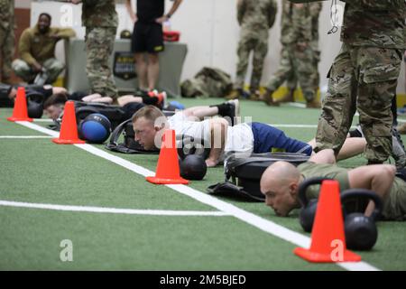 Tech. Sgt. Michael Samsa, a security forces with the 134th Security Forces Squadron, 164th Air Refueling Wing, prepares to execute the sprint, drag carry event during the 2022 Tennessee National Guard's Best Warrior Competition in Murfreesboro on Feb. 23. Soldiers and Airmen from the major commands of the Tennessee National Guard and the Bulgarian army performed the Army Combat Fitness Test, which  simulates combat-related tasks. Stock Photo