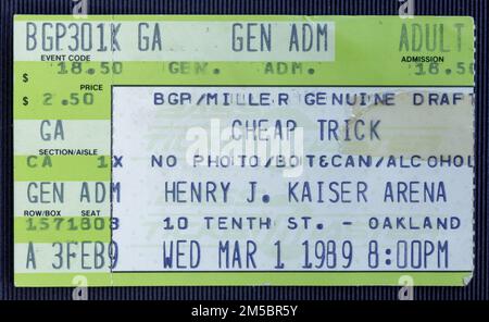 Oakland, California - March 1, 1989 - Old used ticket stub for Cheap Trick concert at the Kaiser Arena Stock Photo