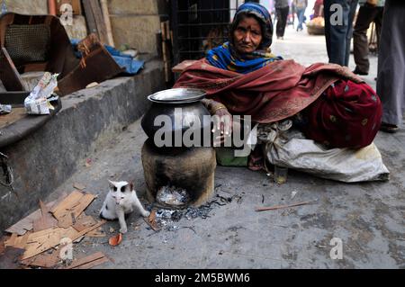 A homeless Bengali woman living on the streets of Kolkata, India. Stock Photo