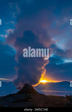 Mud pot with steam source at sunrise, Hverir solfataras field ...