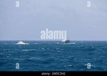 220227-N-GF955-1024  CARIBBEAN SEA - (Feb. 27, 2022) -- The Virginia-class fast attack submarine USS Minnesota (SSN 783) and the Freedom-variant littoral combat ship USS Billings (LCS 15) participate in a bilateral anti-submarine warfare exercise with the Colombian navy, Feb. 27, 2022. Billings is deployed to the U.S. 4th Fleet area of operations to support Joint Interagency Task Force South’s mission, which includes counter-illicit drug trafficking missions in the Caribbean and Eastern Pacific. Stock Photo