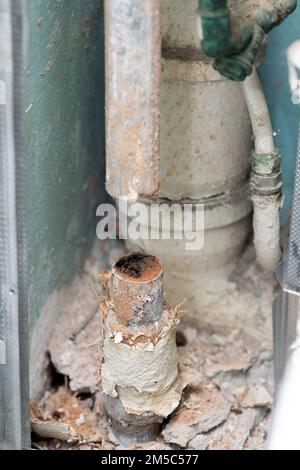 Old water pipe line clogged with rust Stock Photo