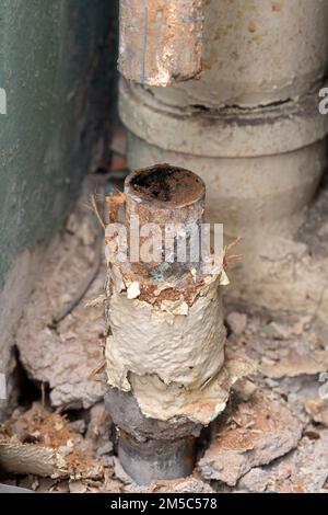Old water pipe clogged with rust Stock Photo