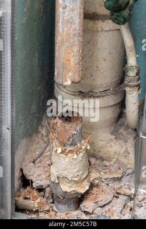 Old water pipe clogged with rust Stock Photo