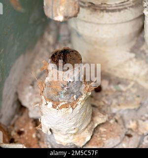 Old water pipe clogged with rust Stock Photo