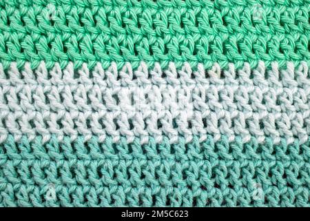 Green color shades, crochet rows, soft focus close up Stock Photo