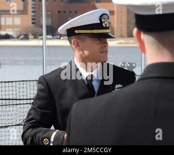 Newly commissioned Chief Warrant Officer 2 Chris Harold prepares to provide some remarks as part of his commissioning ceremony aboard the Battleship Wisconsin. The commissioning ceremony was hosted by the Hampton Roads Naval Museum, located next door to the Battleship in Downtown Norfolk, Virginia. Stock Photo