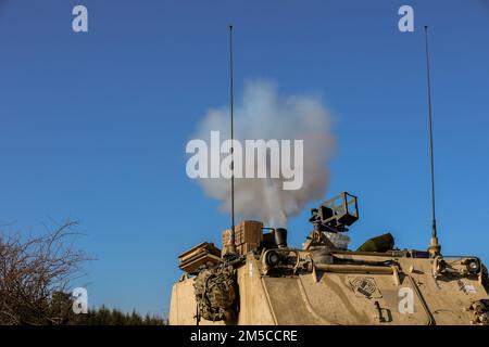 A mortar round exits the chamber during Saber Strike 22 at Hradiště Military Area, Northwest Czech Republic, March 01, 2022. Soldiers from 2nd Battalion, 34th Armored Regiment, 1st Armored Brigade Combat Team, 1st Infantry Division shot mortars alongside Czech Republic soldiers proving that interoperability is a state of readiness that we collectively and continuously strive to enhance. Stock Photo