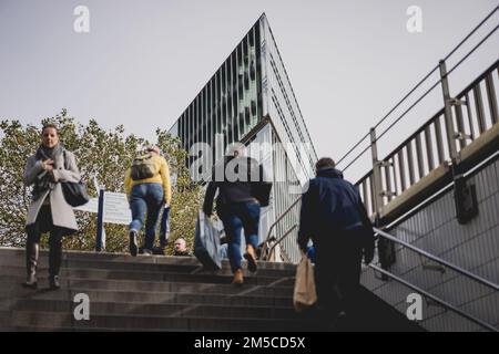 People commuting to work early in the morning in Hamburg, Germany Stock Photo