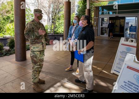 Brig. Gen. Darwin Craig, director of joint staff, Utah National Guard, was greeted by hospital staff in front of St. George Regional Hospital in St. George, Utah, on March 1, 2022. In light of recent healthcare staff shortages, Craig was met with gratitude and glowing remarks from board members and staff regarding the support from Utah National Guard members of the COVID-19 Joint Task Force as he visited health care facilities in and around St. George. Stock Photo