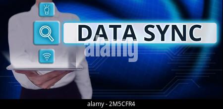 Conceptual caption Data Sync. Business idea data that is continuously generated by different sources Stock Photo