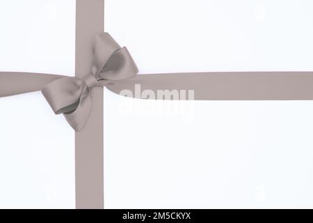 Satin ribbon bows for gift pack in black colors, isolated on white ...