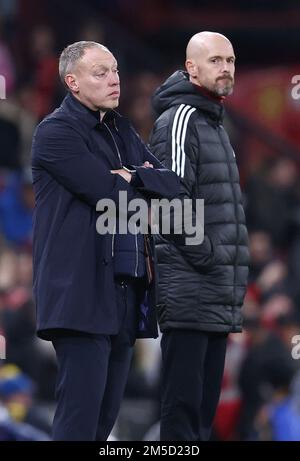 Manchester, England, 27th December 2022.  Steve Cooper manager of Nottingham Forest and Erik ten Hag manager of Manchester United during the Premier League match at Old Trafford, Manchester. Picture credit should read: Darren Staples / Sportimage Stock Photo