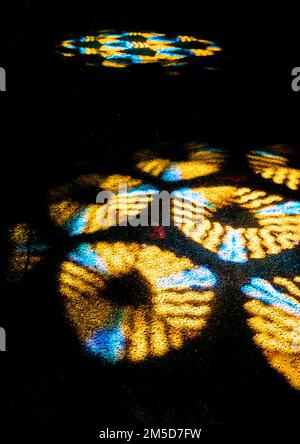 A vertical shot of colorful snowflake patterns on the Blenheim Christmas Lights Trail Stock Photo