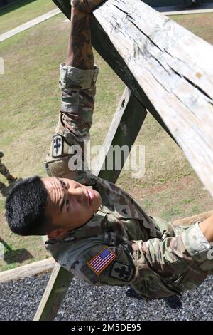 Hawaii Army National Guard (HIARNG) Soldier Sgt. Fred M. Lino Jr., a small arms and artillery repairer assigned to Echo Troop, Forward Support Company 227th Brigade Engineer Battalion (BEB), participates in the annual Best Warrior Competition (BWC) at the Regional Training Institute (RTI), Waimanalo, Hawaii, March 4, 2022. The Best Warrior Competition is designed to challenge the physical, emotional and mental fortitude of Soldiers in Army warrior tasks and drills. Soldiers and Non-Commissioned Officers (NCOs) competed from March 3-6, 2022 at several Army installations throughout Hawaii. Stock Photo