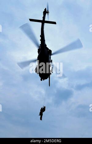 Pararescuemen assigned to the 31st Rescue Squadron board a Royal ...