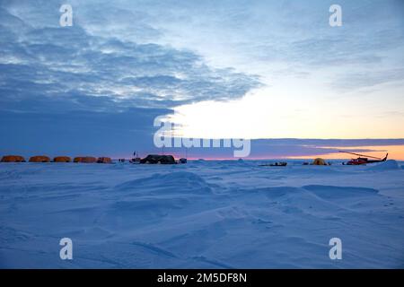 220304-N-ON977-1006 BEAUFORT SEA, Arctic Circle (March 4, 2022) – Ice Camp Queenfish during Ice Exercise (ICEX) 2022. ICEX 2022 is a three-week exercise that allows the Navy to assess its operational readiness in the Arctic, increase experience in the region, advance understanding of the Arctic environment, and continue to develop relationships with other services, allies, and partner organizations. Stock Photo