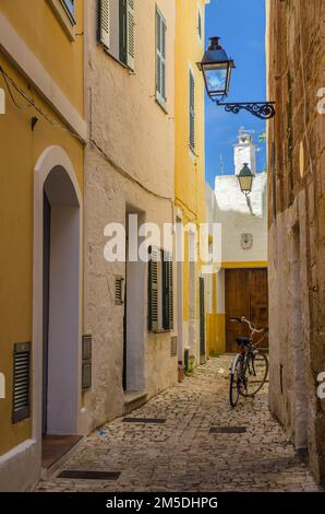 A bicycle in a narrow cobbled street in the ancient capitaly of Ciutadella, Menorca, Spain Stock Photo