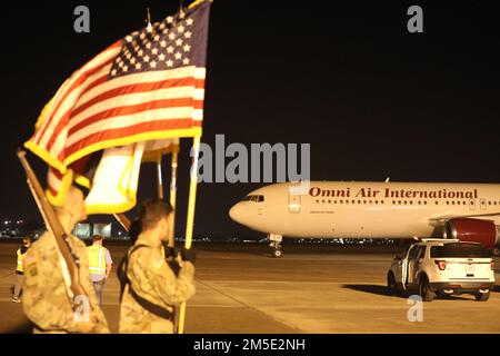 The 3rd Division Sustainment Brigade Soldiers arrive to Hunter Army Airfield, Georgia March 7, 2022. Soldiers from the 414th Signal Company, Division Special Troops Battalion, 90th Human Resources Company, DSTB and Headquarters and Headquarters Company, DSTB advanced elements return from a nine-month deployment in the Middle East. Stock Photo