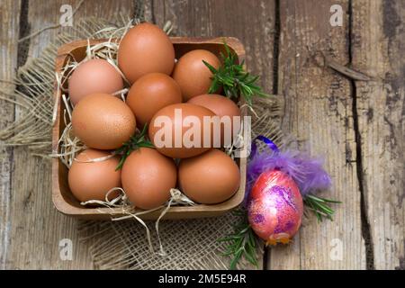 eggs in a bowl on wooden background Stock Photo