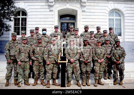 New Jersey National Guard Soldiers pose for a group photo at the Russell Senate Office Building March 7, 2022. At the invitation of the offices of U.S. Senators Cory Booker and Bob Menendez, the Soldiers were given a tour of the Capitol Building. Approximately 100 New Jersey service members were activated to assist the District of Columbia National Guard supporting D.C. Metro Police and U.S. Capitol Police with traffic control in anticipation of First Amendment demonstrations in the Capitol Region. Stock Photo