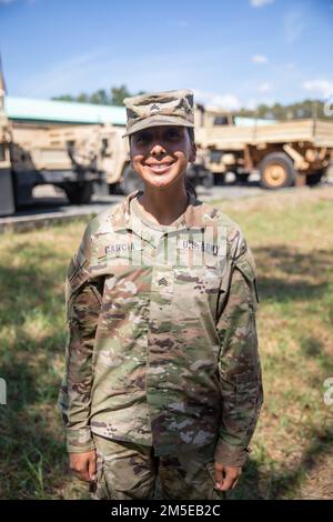 U.S. Army Sgt. Alondra Garcia, a mechanic with 3rd Battalion, 25th Aviation Regiment, 25th Combat Aviation Brigade, 25th Infantry Division, poses for photos to celebrate International Women's Day during Salaknib 2022 on Fort Magsaysay, Nueva Ecija, Philippines, March 7, 2022. Nearly 1,100 U.S. Army Pacific Soldiers will participate in Salaknib alongside their Philippine counterparts to improve interoperability and strengthen our partnership across the Indo-Pacific. Stock Photo