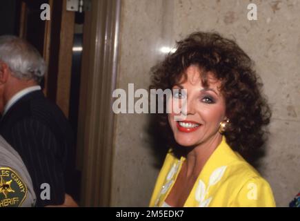 Joan Collins  in court against former husband Peter Holm. Holm was limited 20% of Collins' assets based on their initial premarital pact. July 24, 1987 Credit: Ralph Dominguez/MediaPunch Stock Photo