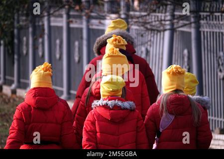 Kiev, Ukraine November 1, 2019: A family in the same clothes went for a walk Stock Photo