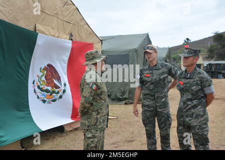220703-M-FK450-1004-MX MARINE CORPS BASE HAWAII (July 3, 2022) - Republic of Korea Marines visits Mexican Marine Corps camp at Marine Corps Base Hawaii during Rim of the Pacific (RIMPAC) 2022. Twenty-six nations, 38 ships, four submarines, more than 170 aircraft and 25,000 personnel are participating in RIMPAC from June 29 to Aug. 4 in and around the Hawaiian Islands and Southern California. The world's largest international maritime exercise, RIMPAC provides a unique training opportunity while fostering and sustaining cooperative relationships among participants critical to ensuring the safet Stock Photo