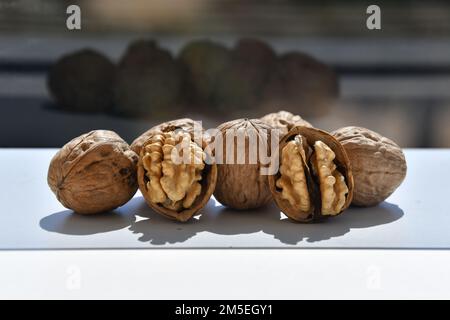 Some walnuts on the white background Stock Photo