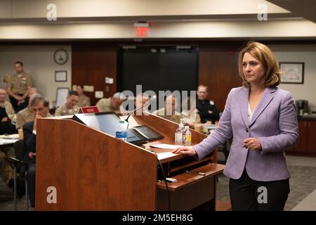 Deputy Secretary of Defense Kathleen H. Hicks speaks with senior U.S. Navy officers, master chiefs and civilians during the Navy’s 3-4 Star Symposium at the Washington Navy Yard, Washington D.C., March 8, 2022. Stock Photo