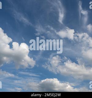 Image of a blue summer sky with wispy white clouds Stock Photo