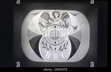 1957, on-screen BBC television symbol. This was a version of the 1953 Bat's Wings design by Abram Games, a freelance graphic designer, who had designed the graphics for the 1951 Festival of Britain and now acknowledged as one of the best of the 20-century. In this era, the early days of television, a test card was shown between programmes and so the BBC asked a number of designers to create something more visually different. Games winning design, which became known as the 'Television Symbol' or the Thing, was used by the BBC until 1961. Stock Photo