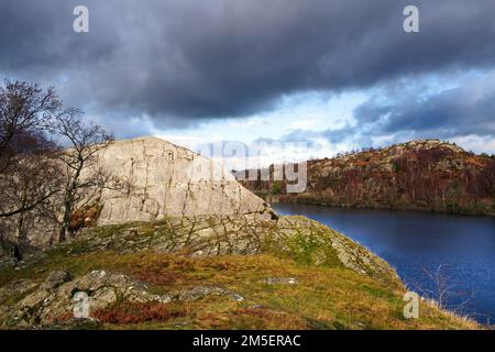 A view looking across Lake Padarn from the rocky crag of Craig yr Undeb (Union Rock) in the Snowdonia National Park. Stock Photo