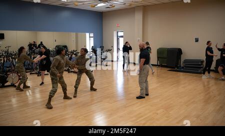 Members of Team Whiteman participate in a women’s self-defense class last month at Whiteman Air Force Base, Missouri. The class covered a variety of self-defense techniques for how to respond to and escape from common attacks. Stock Photo