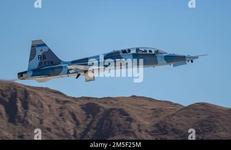 A T-38 Talon assigned to the 12th Flying Training Wing, Joint Base San Antonio-Randolph, Texas, takes off from Nellis Air Force Base, Nevada, March 9, 2022. Air Education and Training Command is the primary user of the T-38 for joint specialized undergraduate pilot training. Stock Photo