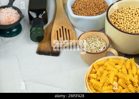 Assortment vegetarian organic products in bowls. Rural and farm view. Top view. Copy space. Stock Photo