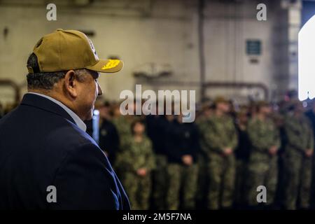 NORFOLK, Va. (Mar. 10, 2022) — Secretary of the Navy Carlos Del Toro prepares to speak to the crew of the Ford-class aircraft carrier USS Gerald R. Ford (CVN 78) during a ship visit March 10, 2022. Secretary Del Toro is in Norfolk for the 100th celebration of Navy aircraft carriers and to conduct a roundtable with senior female leadership during Women’s History Month. Stock Photo