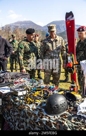 Albanian Land Forces Commander Brigadier General Arben Kingji and U.S. Special Operations Command Europe commander Maj. Gen. David Tabor examine equipment during a military demonstration at the Albanian Special Forces Headquarters in Albania, March 11th, 2022. Special Operations Command Europe recently made the decision to locate a forward-based SOF headquarters, on a rotational basis, in Albania with the HQ being focused on SOF command and control of SOCEUR’s engagements in the region, coordination of Joint Combined Exchange Training engagements, and Civil Military Support Element engagement Stock Photo