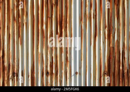 Artistic of old and rusty zinc sheet wall. Vintage style metal sheet texture. Stock Photo
