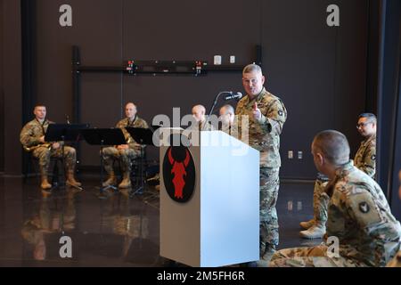 Brig. Gen. Charles Kemper offers remarks at a Change of Command ceremony for the 34th Red Bull Infantry Division which took place, at their headquarters in Arden Hills, Minnesota on March 12, 2022. Outgoing commanding general Maj. Gen. Michael Wickman relinquished command to the incoming commander, Brig. Gen. Charles Kemper. (U.S. Army National Guard photos by Staff Sgt. Sirrina E. Martinez) Stock Photo