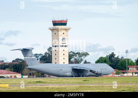A U.S. Air Force C-5M Super Galaxy takes off from Travis Air Force Base, California, March 15, 2022.  The primary mission at Travis AFB is to provide global rapid, responsive, reliable airlift of forces in support of our national objectives and fulfill the needs of the Department of Defense. Stock Photo