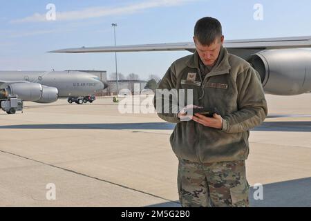 Tech Sgt. Blaine Roberts, an aircraft structural maintainer for the 191st Maintenance Squadron, reviews the maintenance schedule for a KC-135 Stratotanker on Wednesday March 16th, at Selfridge Air National Guard Base, Michigan. As a back-shop of the 191st Maintenance Squadron, structural maintainers are responsible for the inspection, maintenance, and repair of the 127th Air Refueling Group’s fleet of KC-135 Stratotankers. Stock Photo
