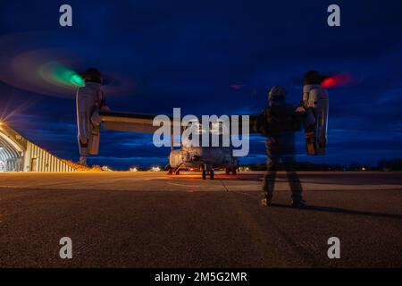 U.S. Marines prepare to taxi a MV-22B Osprey prior to flight at Norwegian Air Force Base Bodø during Exercise Cold Response 22, Norway, March 16, 2022. The Marines are assigned to Marine Medium Tiltrotor Squadron 261, 2nd Marine Aircraft Wing. Exercise Cold Response ’22 is a biennial exercise that takes place across Norway, with participation from each of its military services, as well as from 26 additional NATO allied nations and regional partners. Stock Photo
