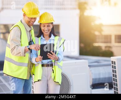 Engineer, man and woman with tablet for online research, schedule for building project and maintenance. Digital, people talking and construction Stock Photo
