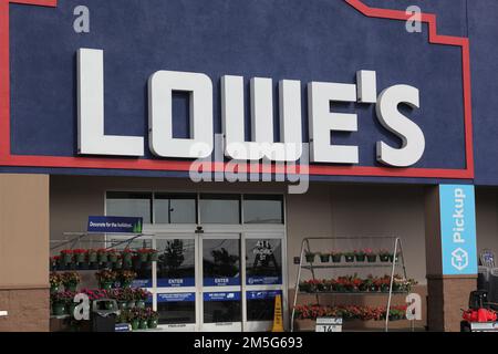 Honolulu, HI -  December 27, 2022: Lowe's home center hardware retailer exterior store front sign Stock Photo
