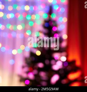 Interior of a room decorated for Christmas, blurry and defocused view Stock Photo