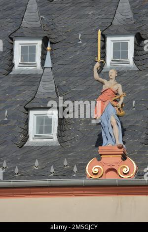 Justitia figure on the roof with dormers of the town hall, market place, Gross-Umstadt, Hesse, Germany Stock Photo