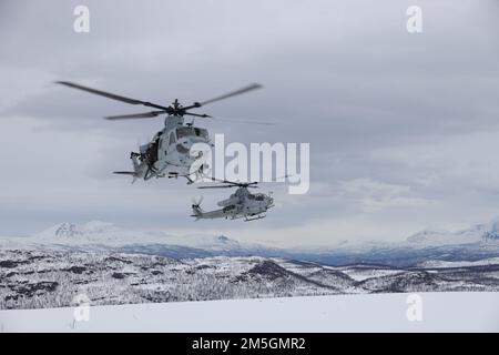 Royal Norwegian Air Force Col. Eirik Stueland lands a UH-1Y Venom during Exercise Cold Response 2022, Setermoen, Norway, March 17, 2022. Stueland is the commanding officer of the Maritime Helicopter Wing and the UH-1Y Venom is assigned to Marine Light Attack Helicopter Squadron 269. Exercise Cold Response '22 is a biennial Norwegian national readiness and defense exercise that takes place across Norway, with participation from each of its military services, as well as from 26 additional North Atlantic Treaty Organization allied nations and regional partners. Stock Photo